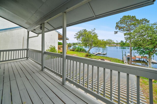 7118 Singleton Cir Unit A, Panama City, FL 32404 - wooden deck featuring a water view and a dock