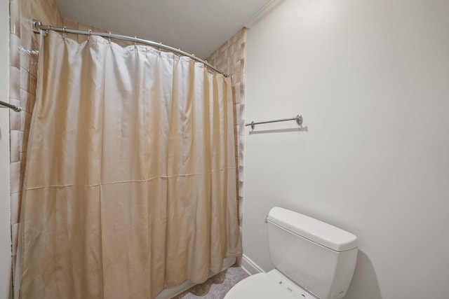 7118 Singleton Cir Unit A, Panama City, FL 32404 - bathroom with a shower with shower curtain and toilet