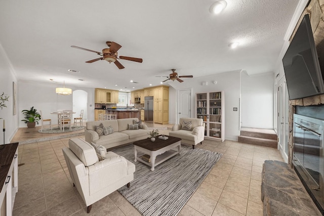 7118 Singleton Cir Unit A, Panama City, FL 32404 - living room with a ceiling fan, light tile patterned floors, recessed lighting, ornamental molding, and baseboards