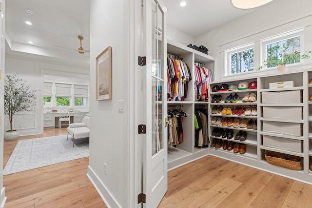 spacious closet featuring wood finished floors