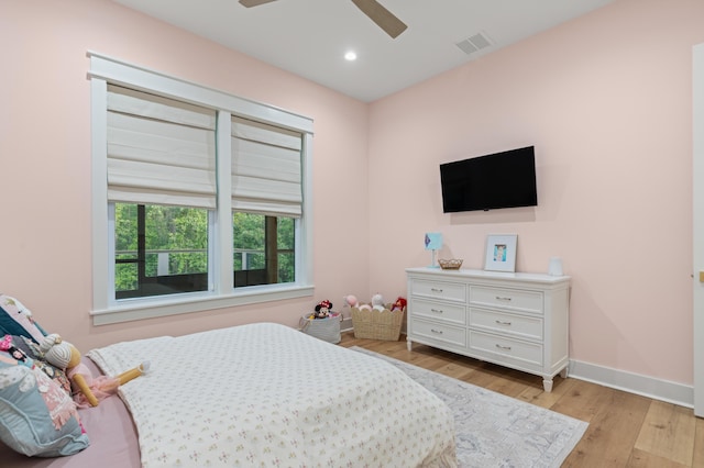 bedroom featuring light wood-type flooring, recessed lighting, ceiling fan, and baseboards