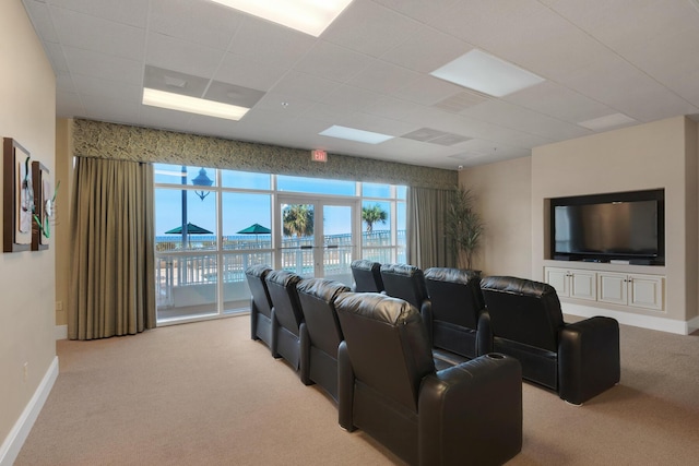 1200 Scenic Gulf Dr Unit B507, Miramar Beach, FL 32550 - cinema room with light colored carpet, a paneled ceiling, and baseboards