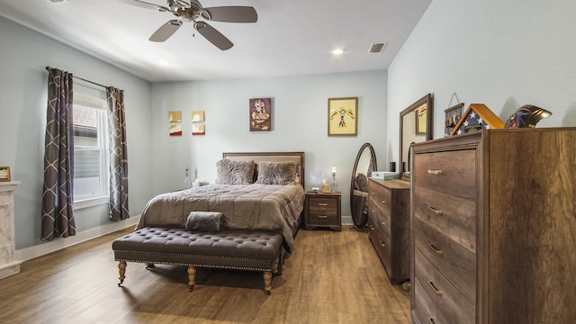 995 Airport Rd Unit 28, Destin, FL 32541 - bedroom with wood finished floors, baseboards, and a ceiling fan