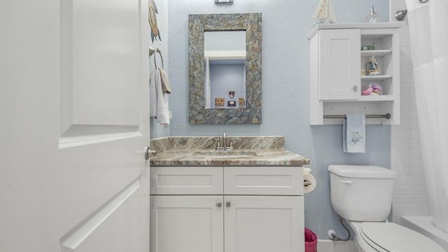 995 Airport Rd Unit 28, Destin, FL 32541 - bathroom with toilet and vanity