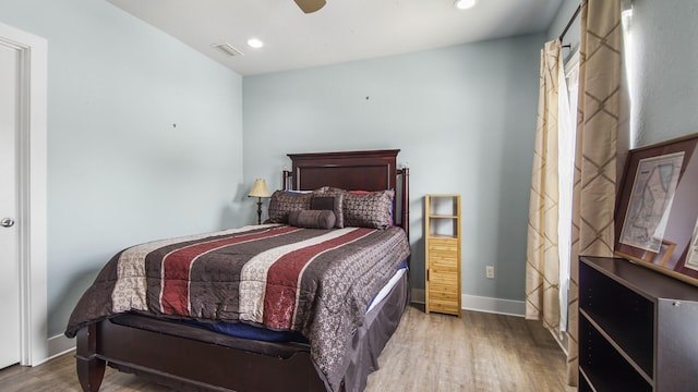 995 Airport Rd Unit 28, Destin, FL 32541 - bedroom featuring wood finished floors, recessed lighting, baseboards, and ceiling fan