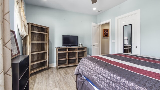 995 Airport Rd Unit 28, Destin, FL 32541 - bedroom with wood finished floors and a ceiling fan