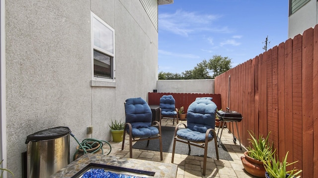 995 Airport Rd Unit 28, Destin, FL 32541 - view of patio / terrace with a fenced backyard