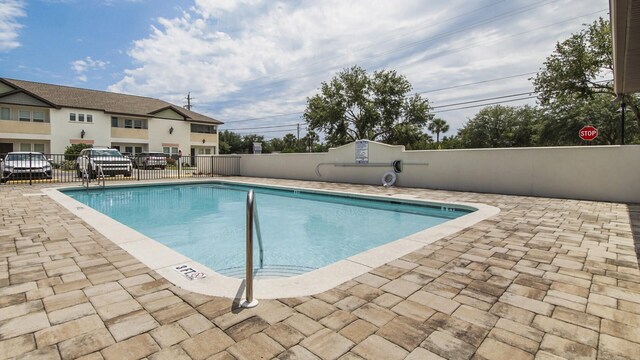 995 Airport Rd Unit 28, Destin, FL 32541 - community pool with fence and a patio