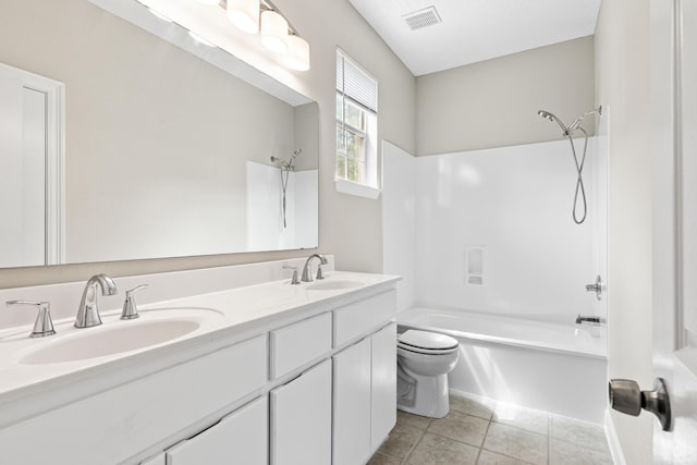 123 Bonaire Blvd, Miramar Beach, FL 32550 - bathroom with tub / shower combination, toilet, tile patterned flooring, and double vanity