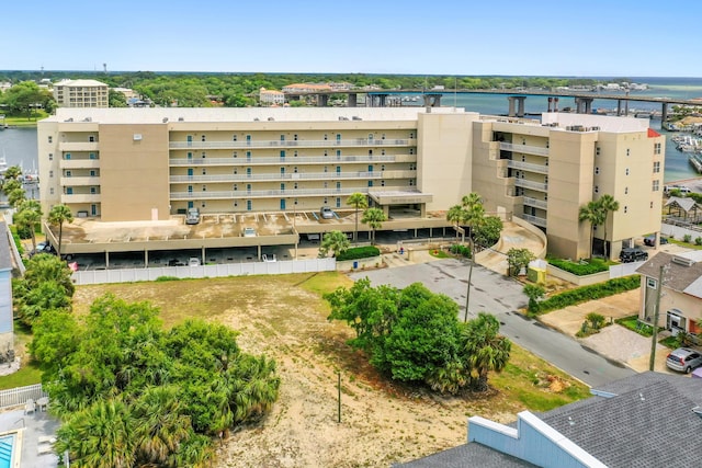 view of apartment building / complex featuring a water view