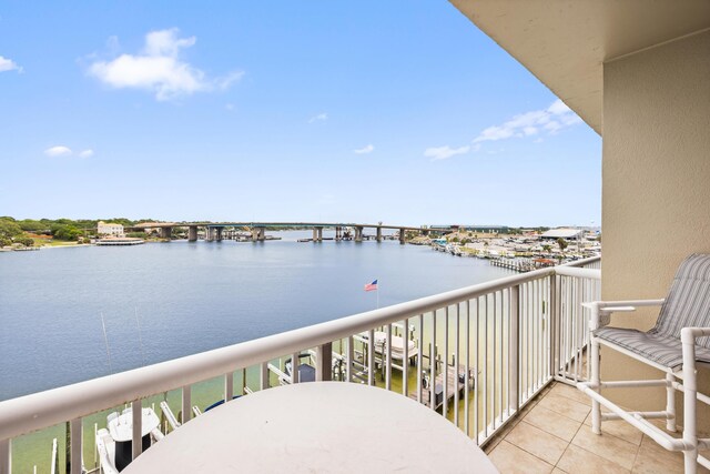 balcony featuring a water view