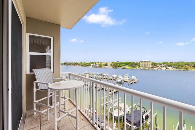 balcony featuring a water view