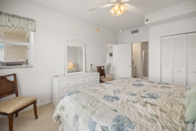 bedroom featuring light carpet, a closet, a ceiling fan, and baseboards