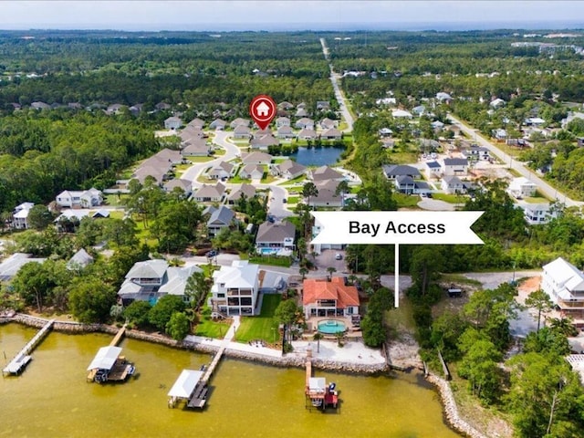 613 Las Roblas Grande Dr, Santa Rosa Beach, FL 32459 - view of property location with a heavily wooded area, nearby suburban area, and a nearby body of water