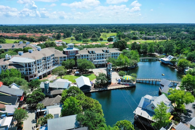 aerial perspective of suburban area with a large body of water
