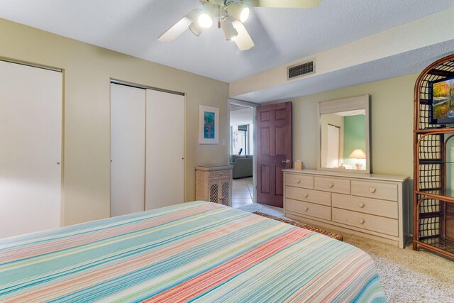 30 Moreno Point Rd Unit 206B, Destin, FL 32541 - bedroom featuring ceiling fan and light carpet