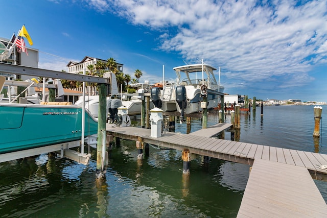 30 Moreno Point Rd Unit 206B, Destin, FL 32541 - dock featuring boat lift and a water view