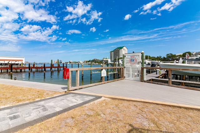 30 Moreno Point Rd Unit 206B, Destin, FL 32541 - dock area featuring boat lift and a water view