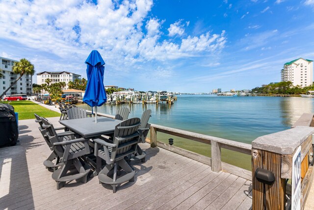 30 Moreno Point Rd Unit 206B, Destin, FL 32541 - dock with outdoor dining space and a deck with water view