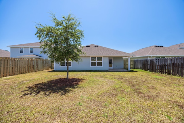 rear view of property featuring a patio area