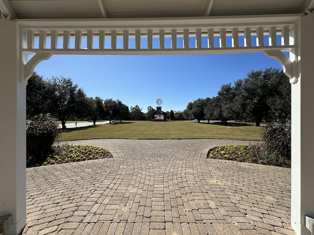 view of home's community featuring a yard