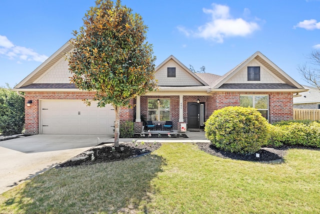 495 Brighton Cv, Freeport, FL 32439 - view of front of home with a garage, a porch, brick siding, driveway, and a shingled roof