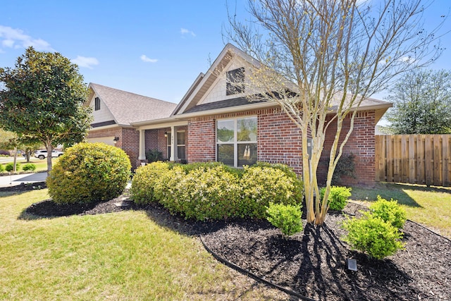 495 Brighton Cv, Freeport, FL 32439 - view of front of house with a garage, brick siding, and roof with shingles