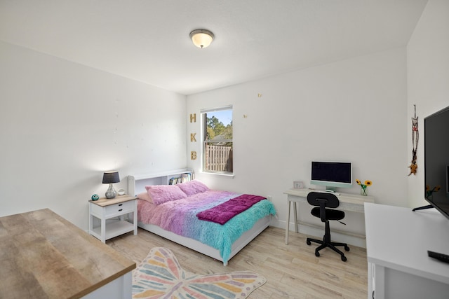 495 Brighton Cv, Freeport, FL 32439 - bedroom with wood finished floors and a desk