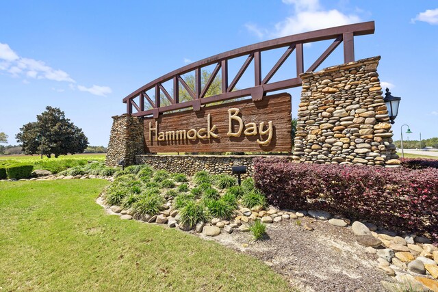 495 Brighton Cv, Freeport, FL 32439 - community / neighborhood sign with a yard