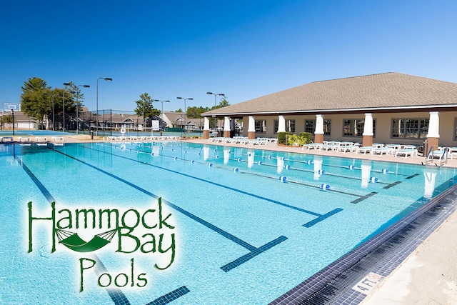 495 Brighton Cv, Freeport, FL 32439 - community pool featuring fence