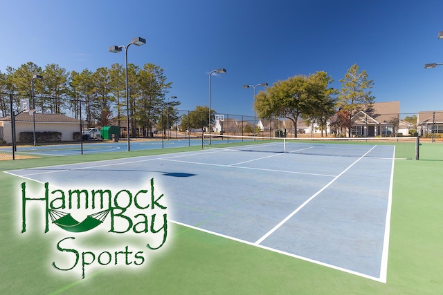 495 Brighton Cv, Freeport, FL 32439 - view of tennis court featuring fence and community basketball court