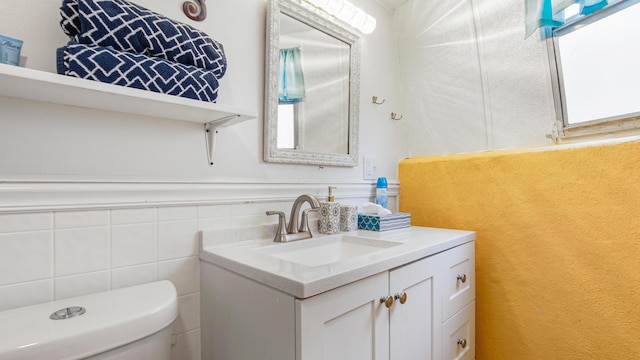 313 13th St, West Panama City Beach, FL 32413 - half bathroom featuring vanity and toilet