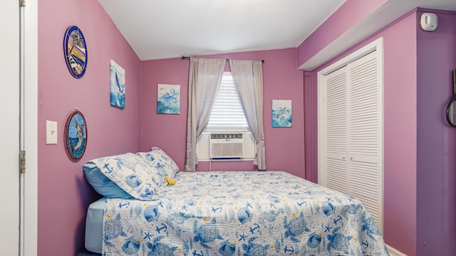 313 13th St, West Panama City Beach, FL 32413 - bedroom featuring cooling unit and a closet