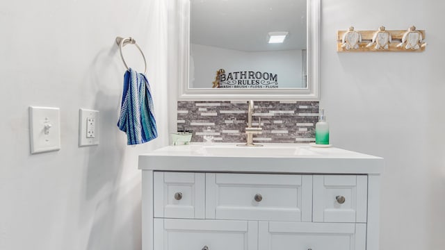 313 13th St, West Panama City Beach, FL 32413 - bathroom featuring decorative backsplash and vanity