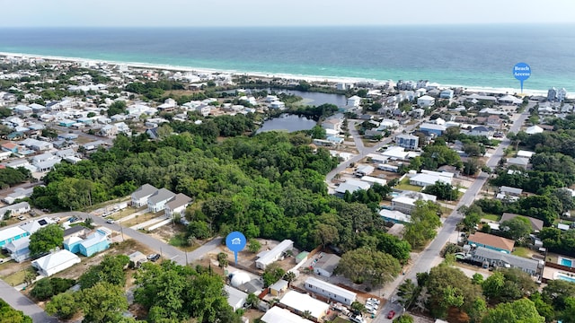 313 13th St, West Panama City Beach, FL 32413 - aerial view of property and surrounding area featuring extended coastline and nearby suburban area