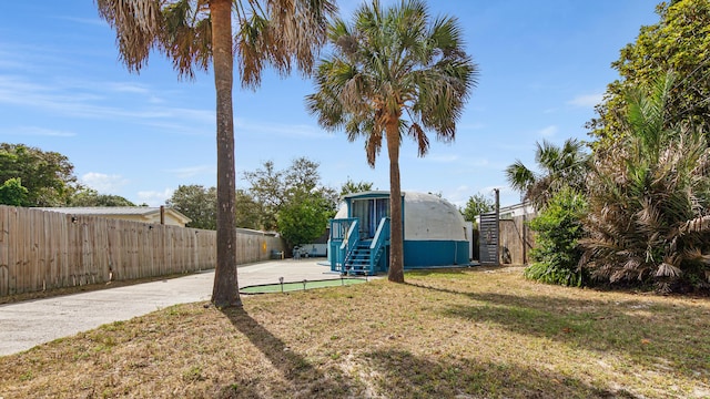 313 13th St, West Panama City Beach, FL 32413 - view of yard with stairs