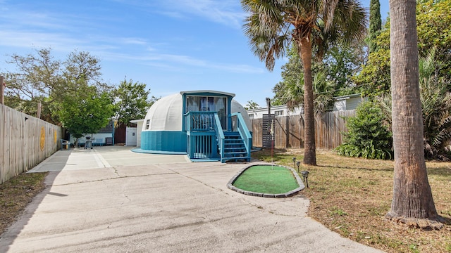 313 13th St, West Panama City Beach, FL 32413 - view of outdoor structure with fence