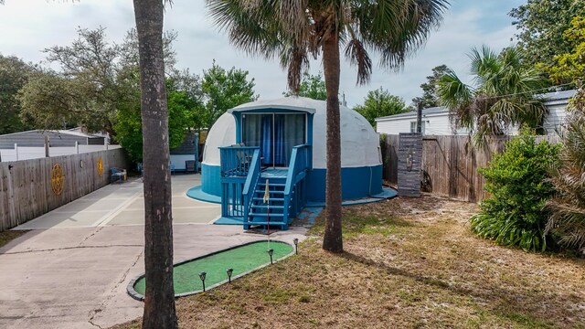 313 13th St, West Panama City Beach, FL 32413 - view of outbuilding featuring a fenced backyard and an outdoor structure