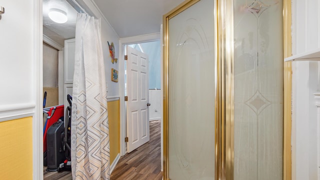 313 13th St, West Panama City Beach, FL 32413 - hall with dark wood-style floors