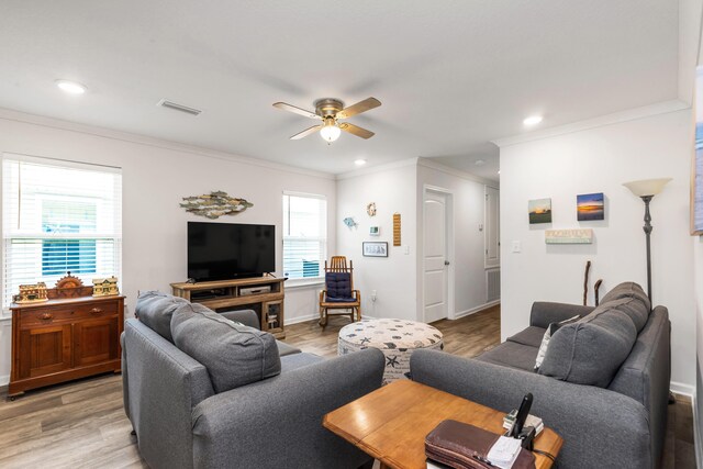 595 Earl Godwin Rd, Freeport, FL 32439 - living area with ornamental molding, a ceiling fan, light wood-style floors, and recessed lighting
