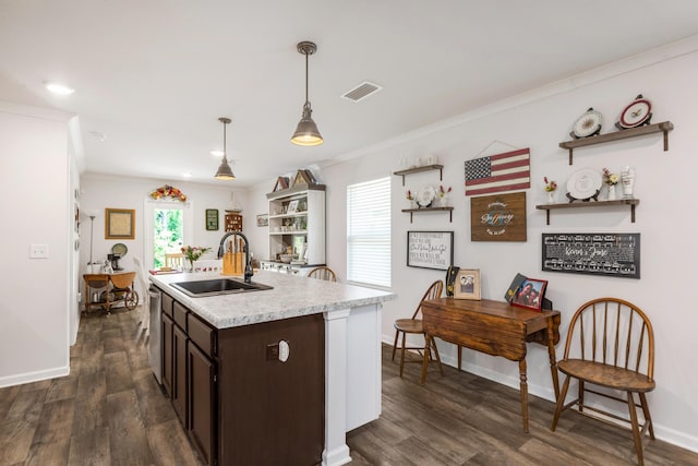595 Earl Godwin Rd, Freeport, FL 32439 - kitchen with a sink, open shelves, dark brown cabinetry, light countertops, and ornamental molding