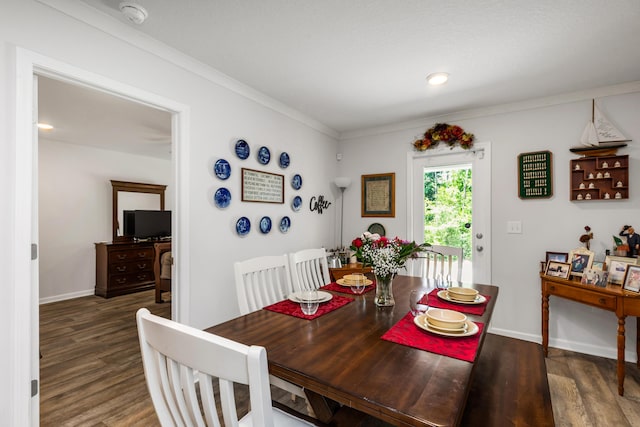595 Earl Godwin Rd, Freeport, FL 32439 - dining room featuring wood finished floors, baseboards, and ornamental molding
