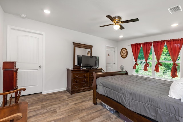 595 Earl Godwin Rd, Freeport, FL 32439 - bedroom featuring wood finished floors, baseboards, recessed lighting, and a ceiling fan