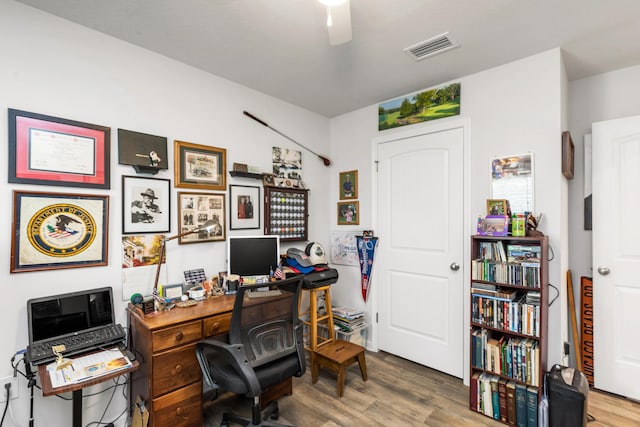 595 Earl Godwin Rd, Freeport, FL 32439 - home office featuring wood finished floors