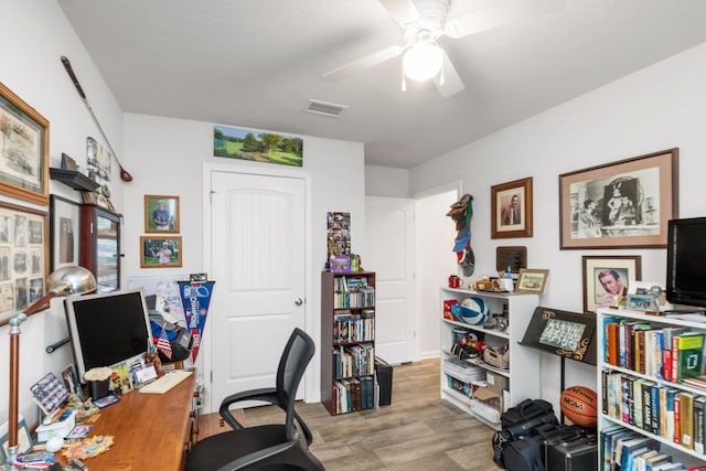 595 Earl Godwin Rd, Freeport, FL 32439 - home office with wood finished floors and a ceiling fan