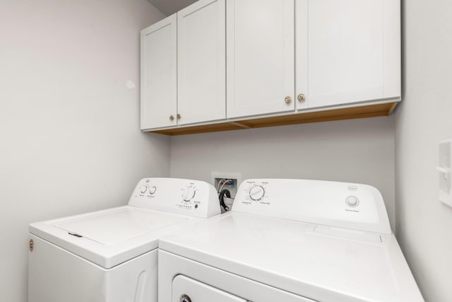 595 Earl Godwin Rd, Freeport, FL 32439 - washroom featuring washing machine and dryer and cabinet space