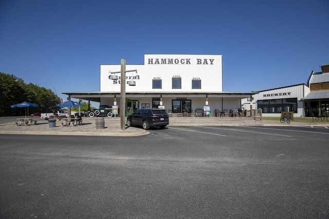 595 Earl Godwin Rd, Freeport, FL 32439 - view of commercial property featuring uncovered parking