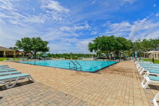 595 Earl Godwin Rd, Freeport, FL 32439 - community pool featuring a patio area