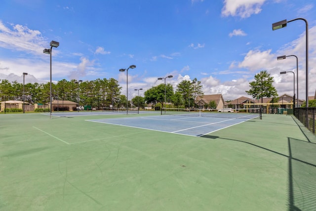 595 Earl Godwin Rd, Freeport, FL 32439 - view of tennis court with community basketball court