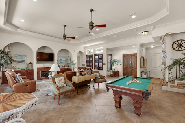 4701 Seastar Vis, Destin, FL 32541 - game room featuring a tray ceiling, ornamental molding, pool table, a fireplace, and recessed lighting